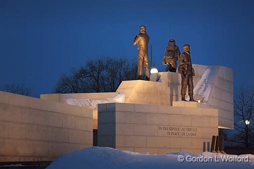 National Peacekeeping Monument_13457.jpg - Honouring Canadians who have served in the United Nations Peacekeeping Forces, this monument depicts three peacekeepers standing on walls above the debris of war.Photographed at Ottawa, Ontario - the capital of Canada.